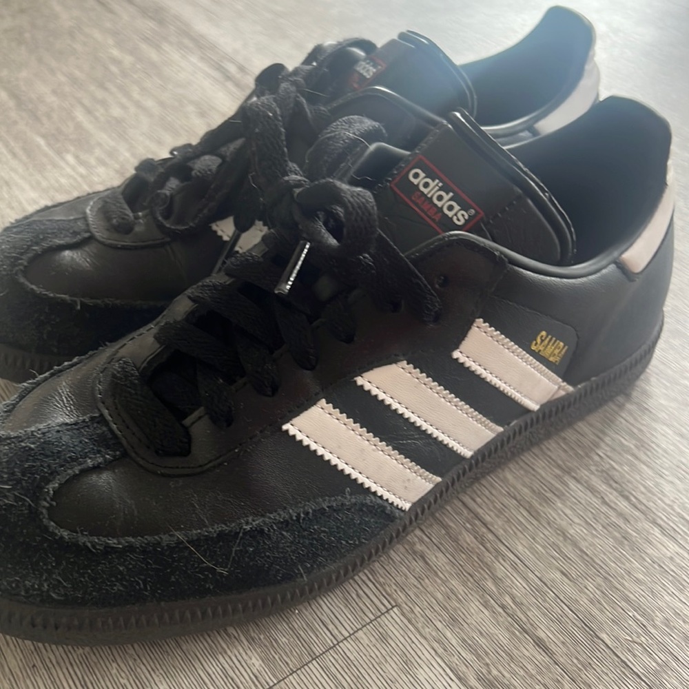 black leather adidas sambas